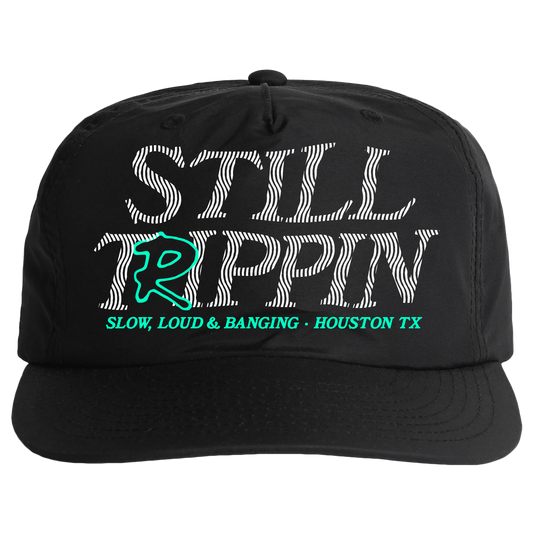 STILL TRIPPIN Snapback